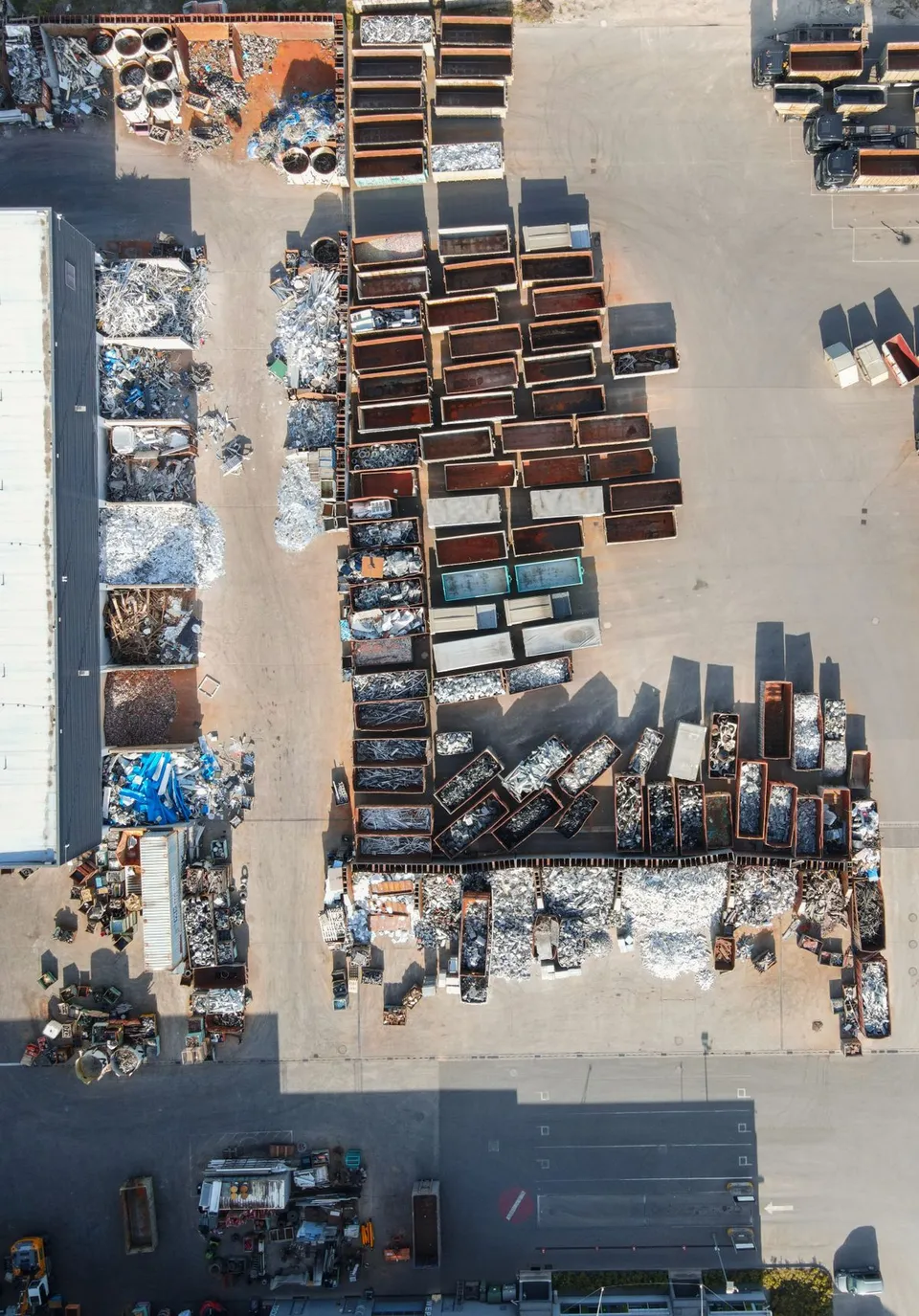 Aerial view of a large garbage dump filled with mixed waste - Pexels