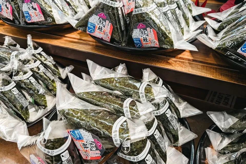 Shelves displaying jars of dried Chinese herbs in a traditional store - Pexels