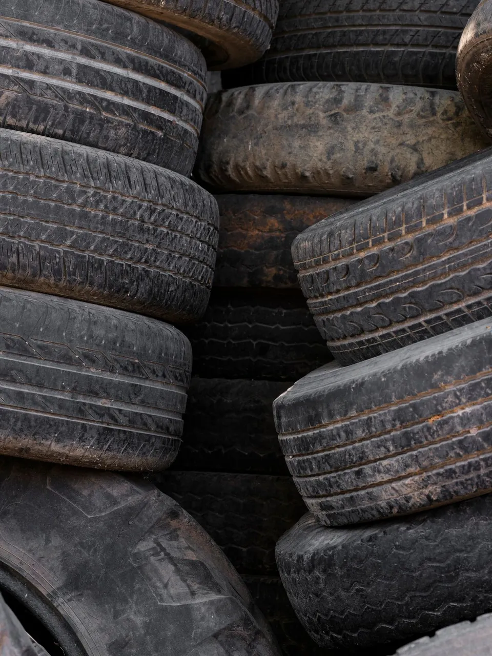Stacked used tires for recycling and reuse - Pexels